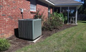 An air conditioning unit sitting outside of a home