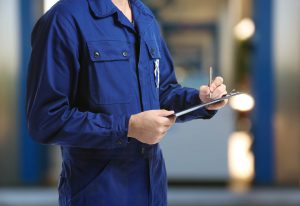 A worker using a clipboard